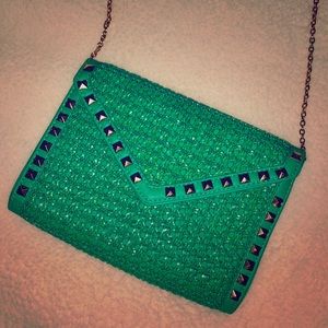 Woven studded clutch